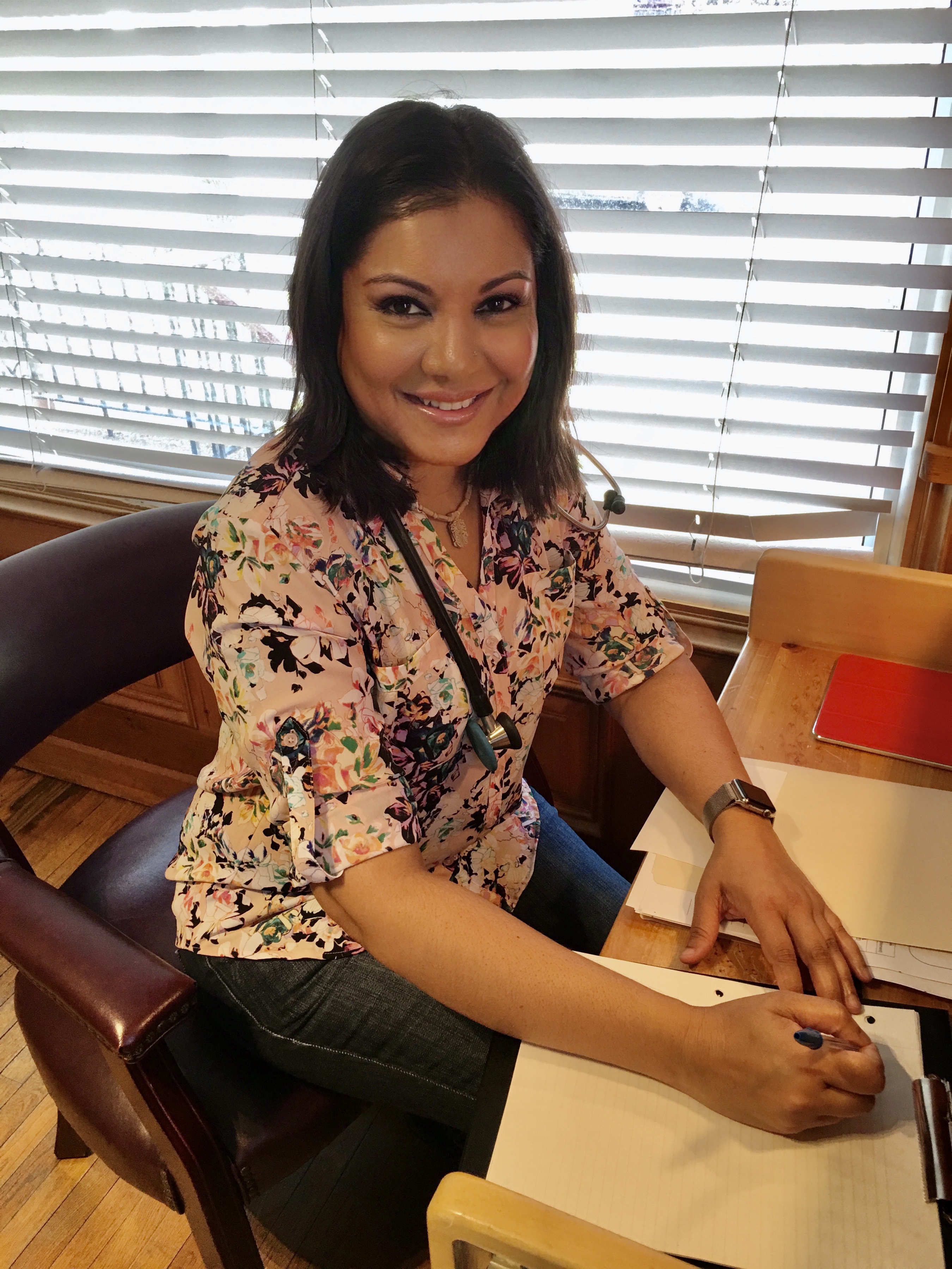 Dr. Arlini Singh at her desk inside Appleby Medical Centre.