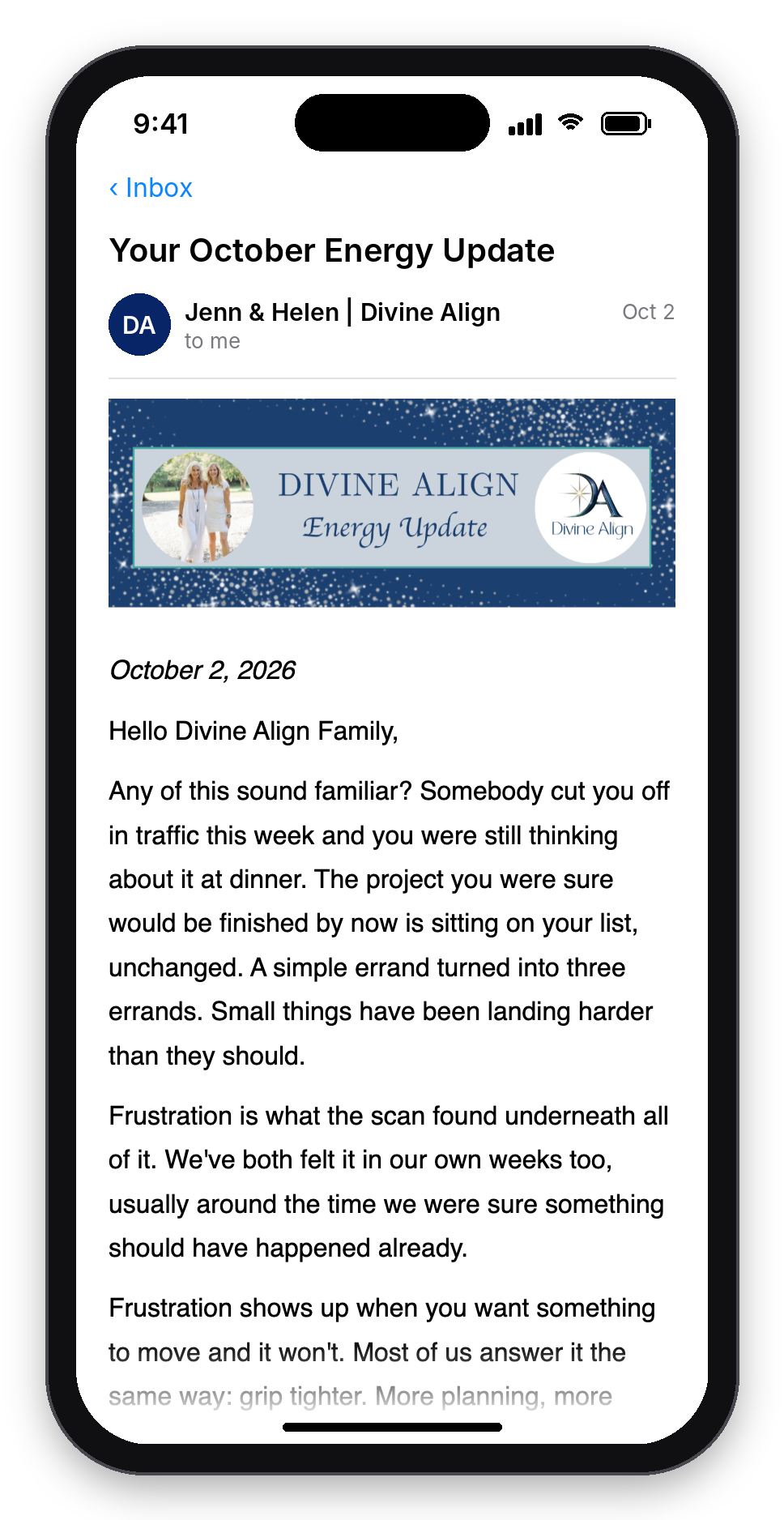 A Divine Align Energy Update email shown on a phone
