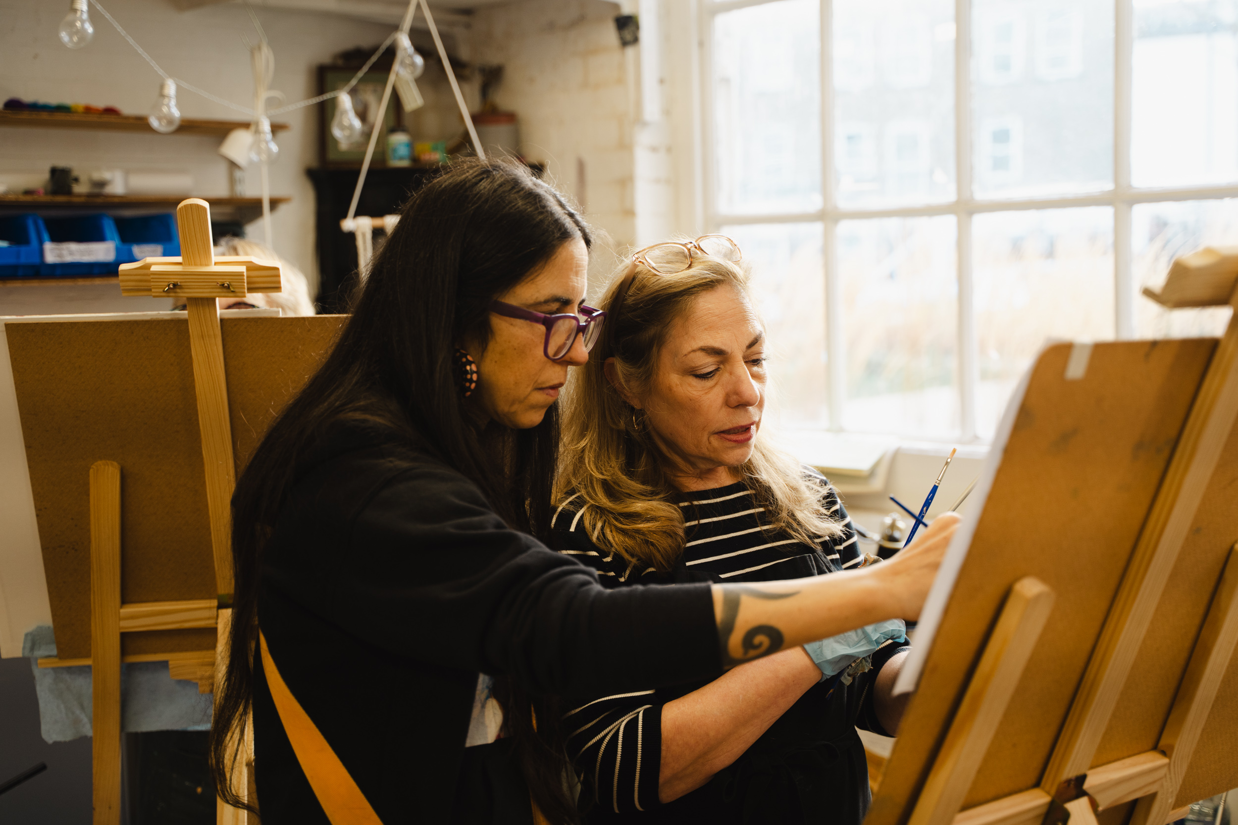 Rosso teaching a student at the easel