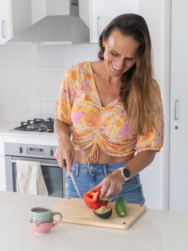 Hayley Ryan cooking in her kitchen