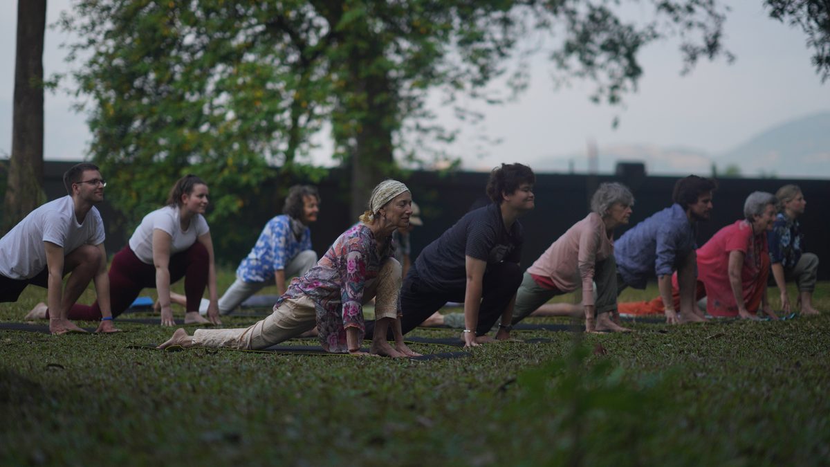 Morning yoga practice in the Sattva Campus yoga hall