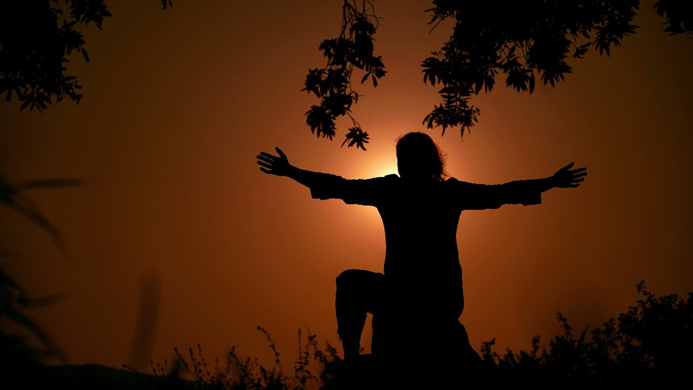 A guest at Sattva Campus at sunset after retreat