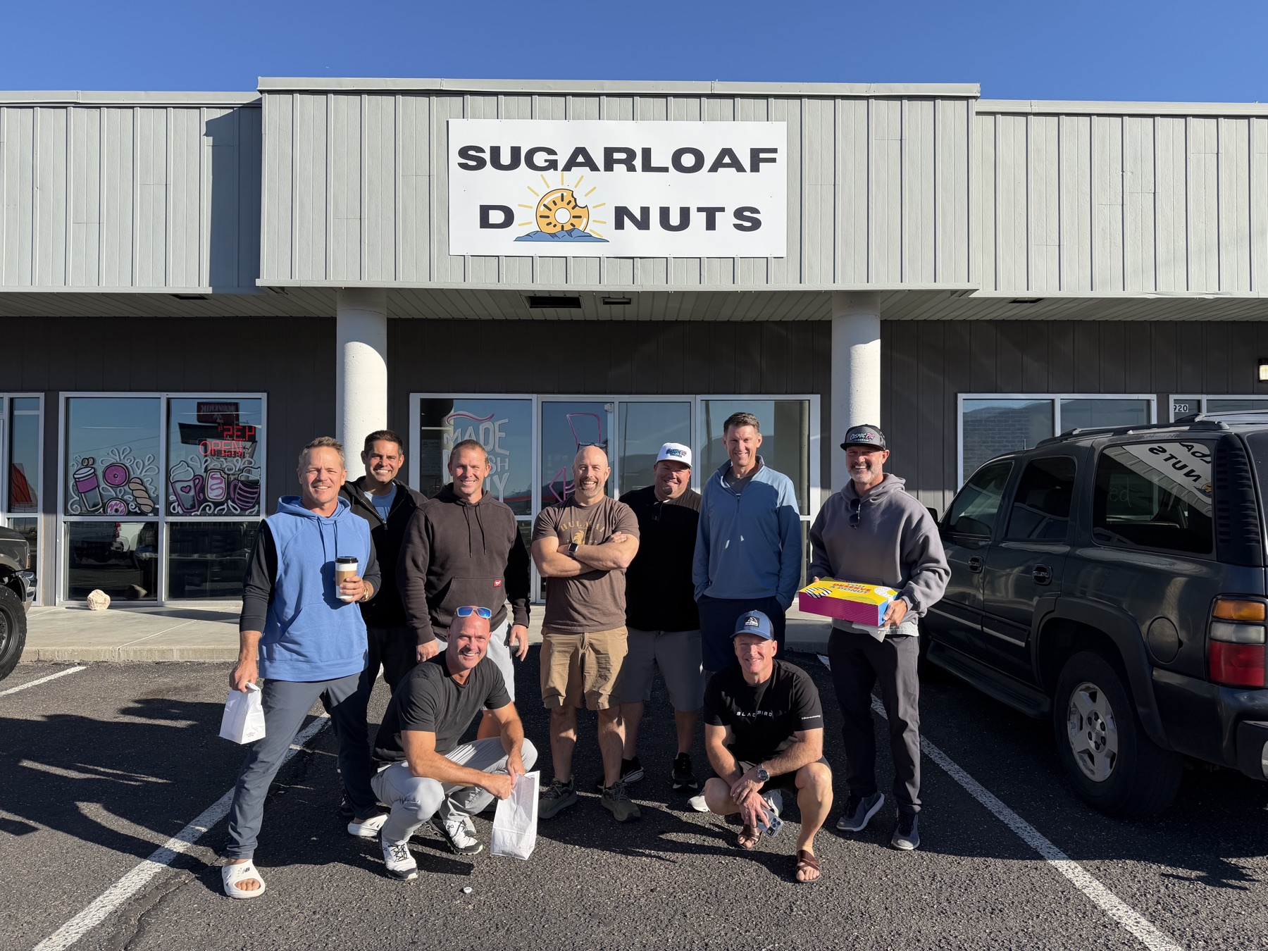 The Man Camp group outside a donut shop on the way to the lake