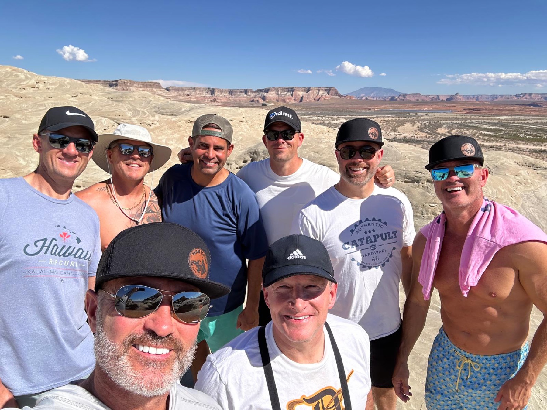 Man Camp participants smiling together before a hike