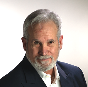 Ernie de los Santos, author of AI Can Make You Visible. It Can't Make You Chosen.