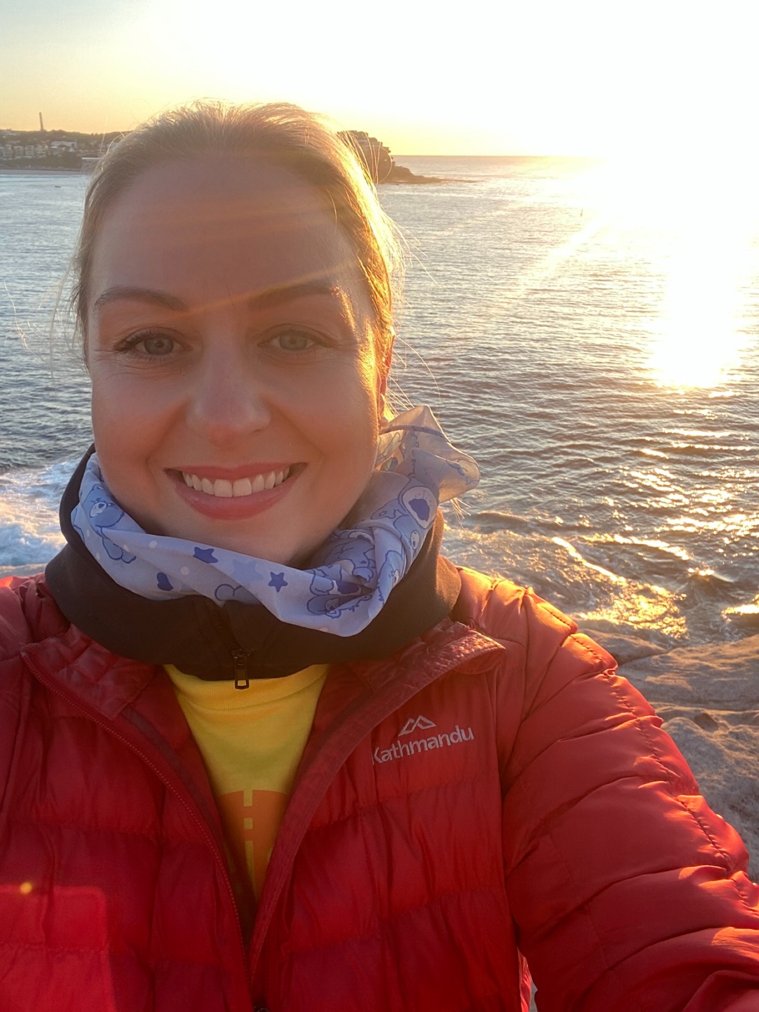 Rebecca at sunrise by the ocean