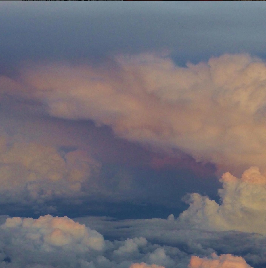 Pink and grey cloudscape seen from above