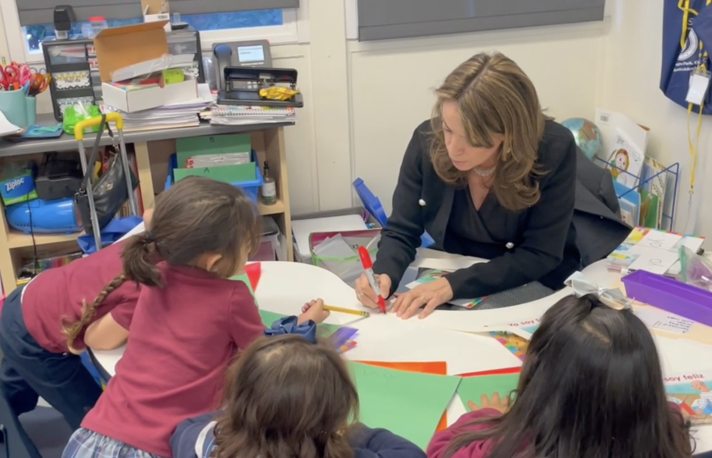 Teacher with students
