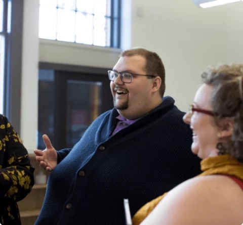 Professionals in conversation at a training