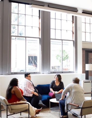 A Body Trust group session in a sunlit room