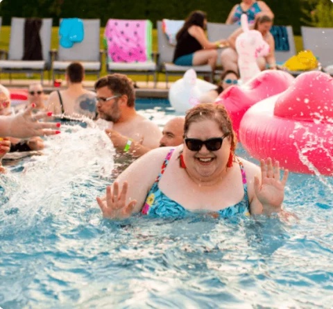People enjoying a pool