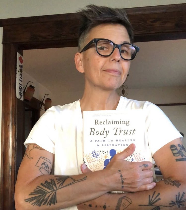 Meg Bradbury holding Reclaiming Body Trust