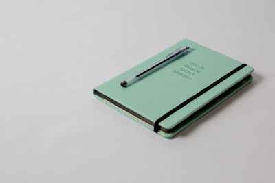Notebook and pen for journaling