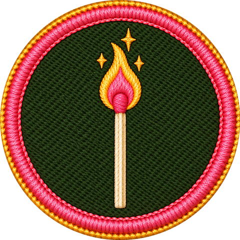 First Spark badge: an embroidered patch of a lit match with a gold and pink flame