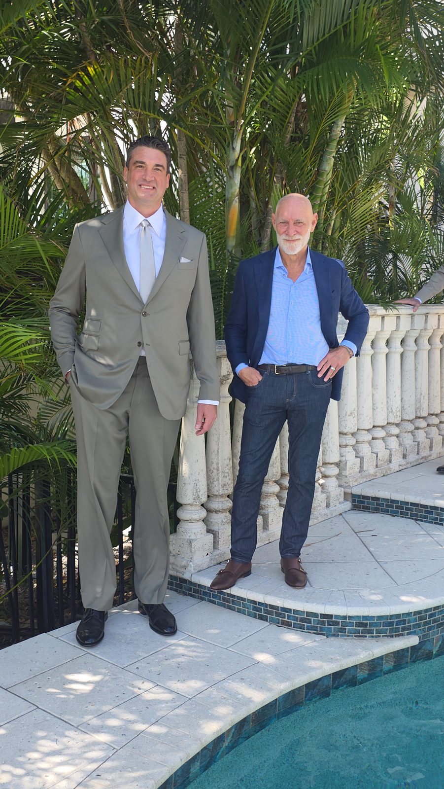 Randy Willard with a client in tailored suits