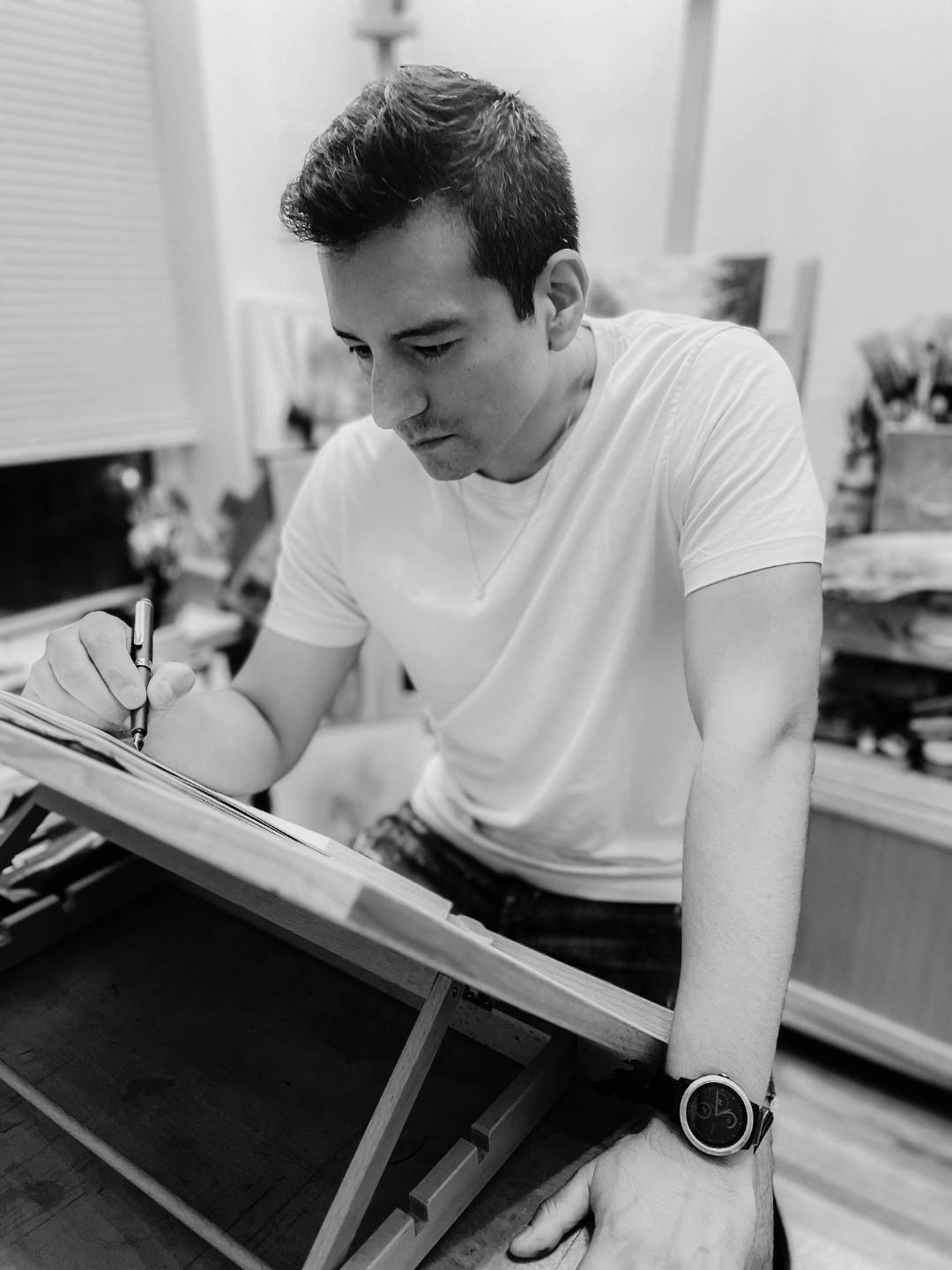 Luis Colan drawing in his New York studio