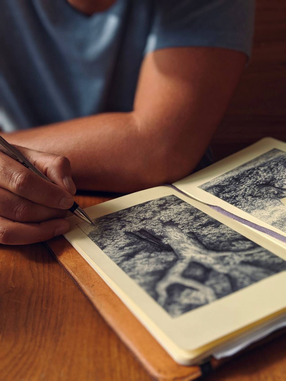 Close-up of ballpoint pen hatching on paper