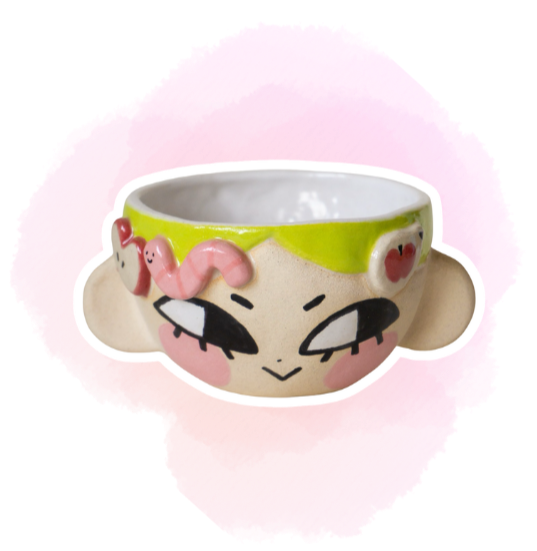 A mug decorated with bold underglaze line work