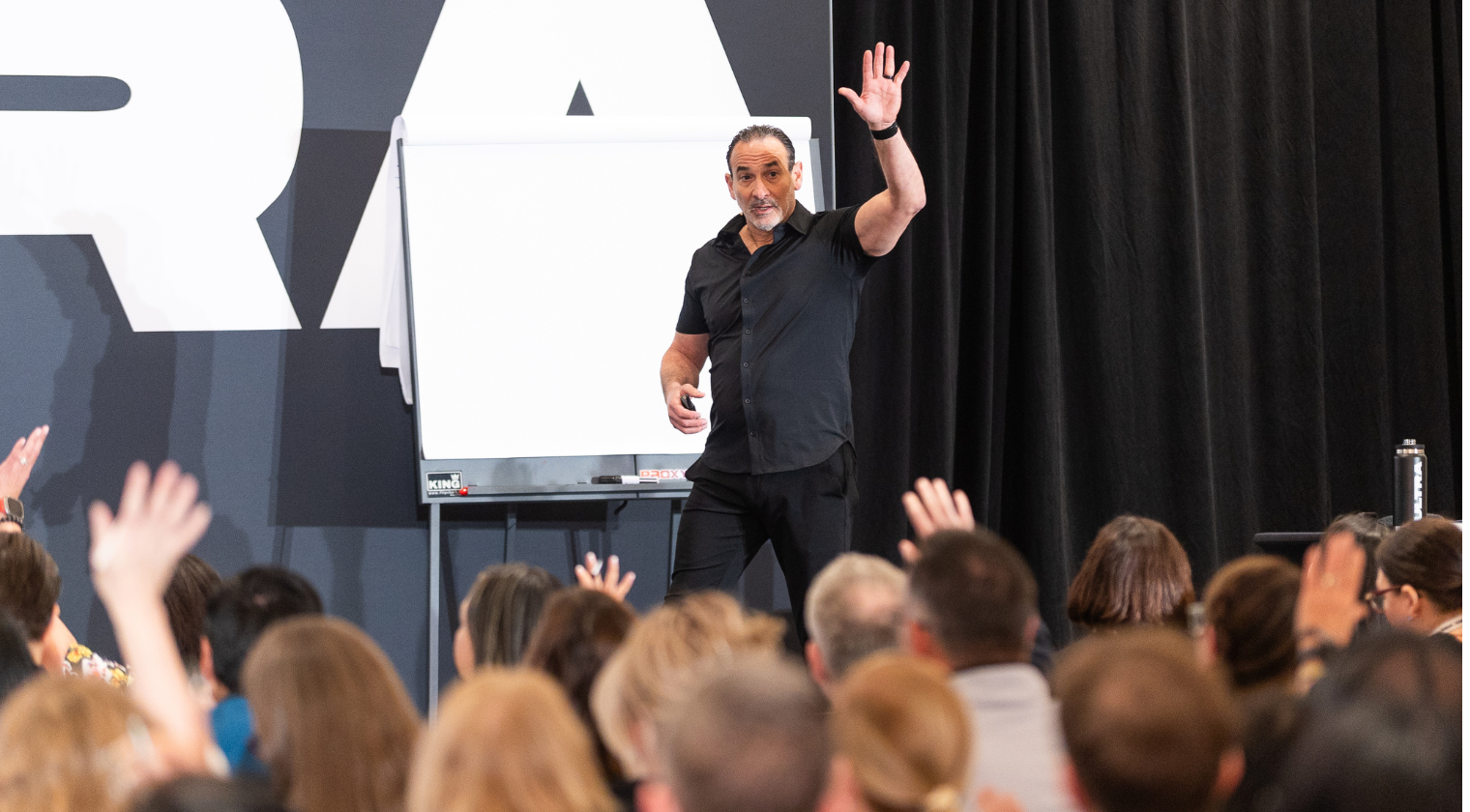 Mel Abraham engaging a full room of attendees