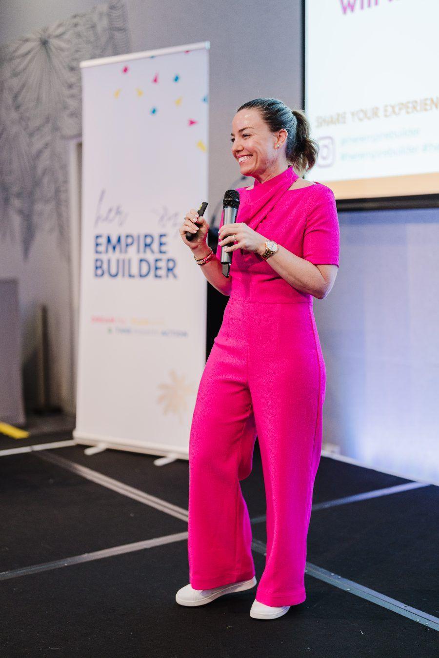 Tina Tower speaking at a Her Empire Builder event