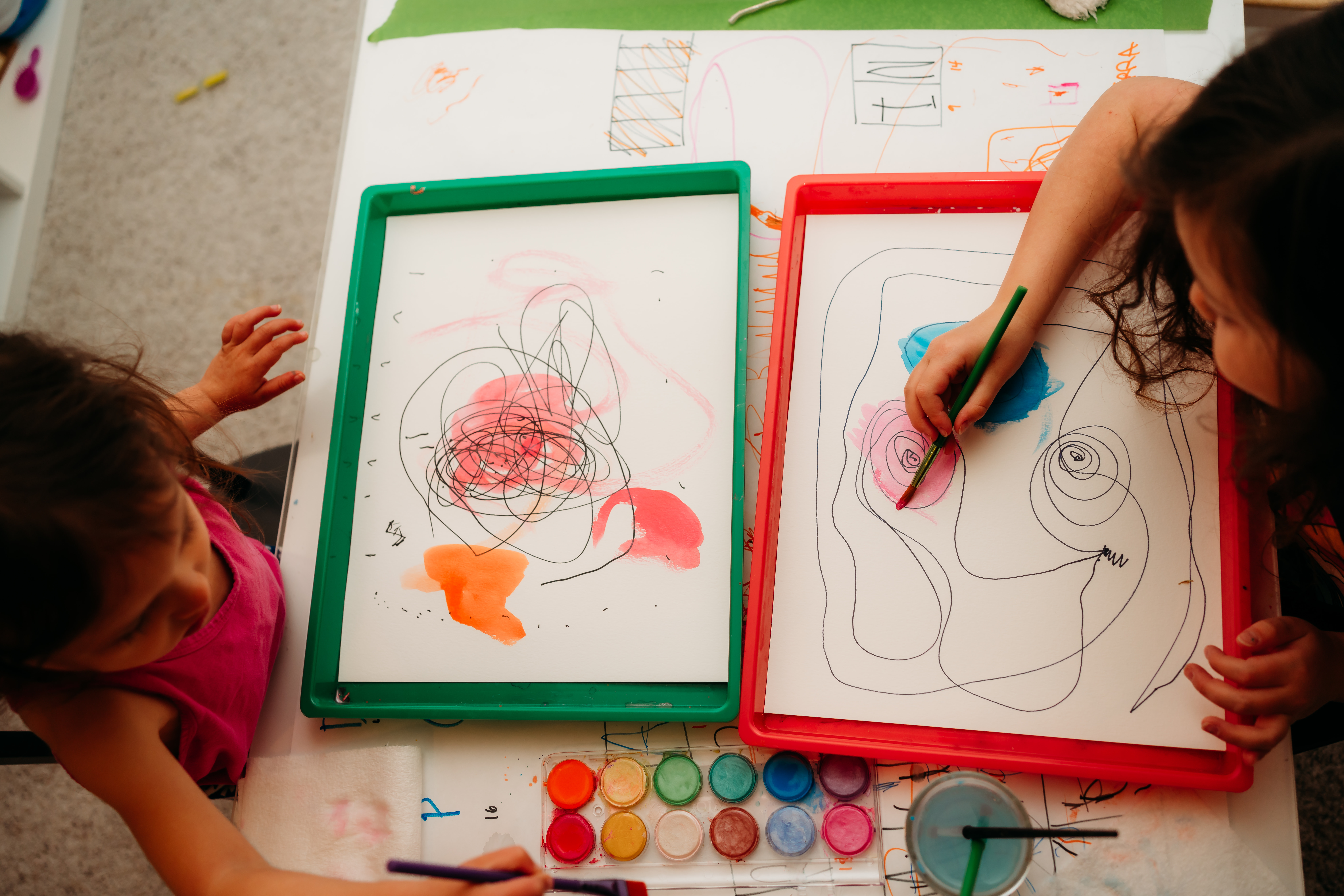 Children drawing and creating together