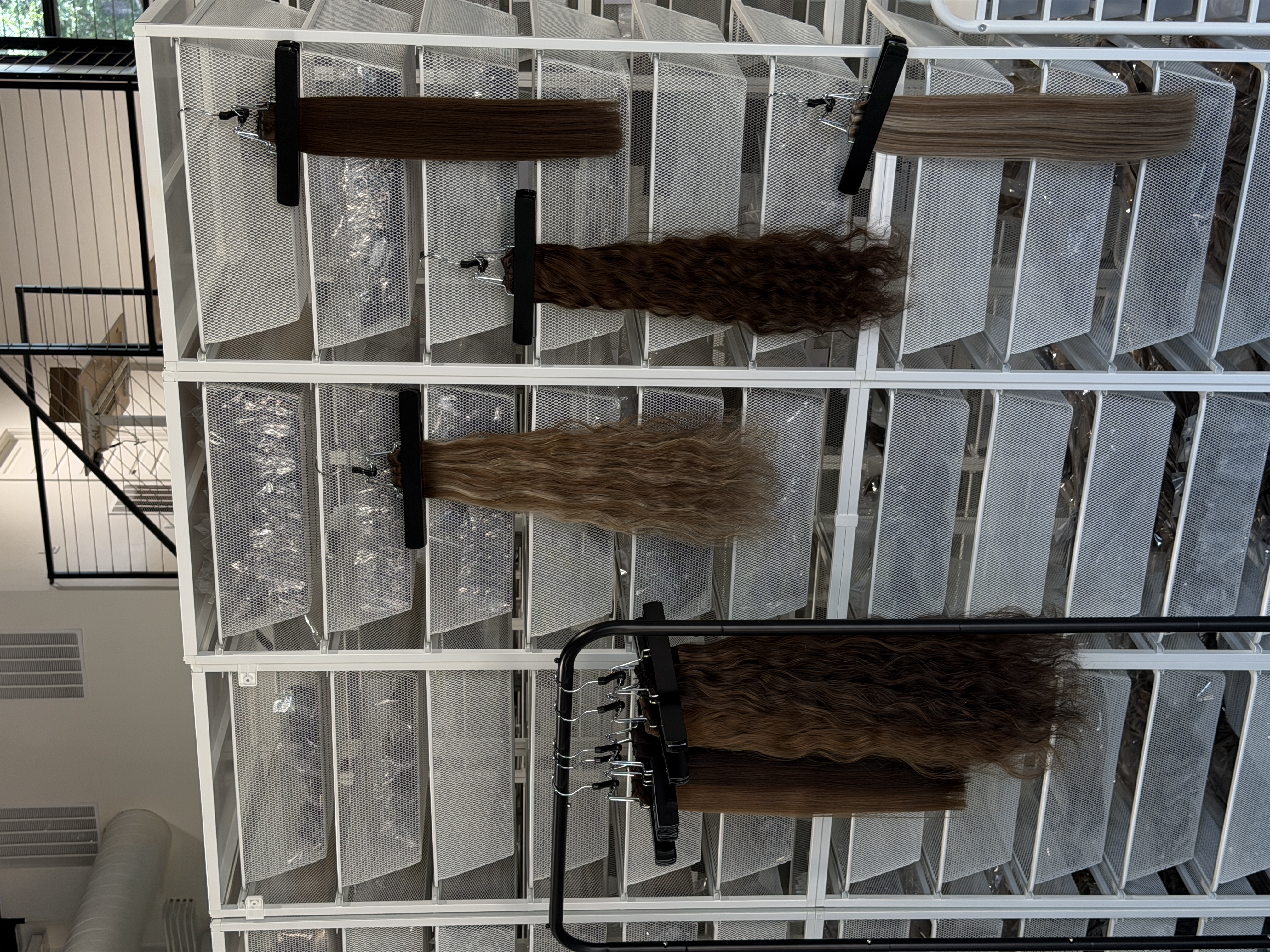 Product bins stocked on the warehouse shelving