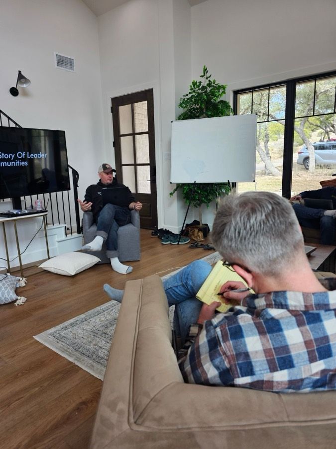 A leader taking notes during a session